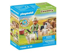 Young Shepherd with flock of sheep