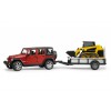 Jeep Wrangler Unlimited Rubicon with trailer and Cat Skid Steer Loader