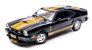 Greenlight - 1/18 1977 Ford Mustang II Cobra II - Black with Gold stripes "'Free Wheelin'"